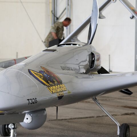 A Turkish Bayraktar TB2 combat drone is on view during a presentation at the Lithuanian Air Force Base in Siauliai, Lithuania, on July 6, 2022. 